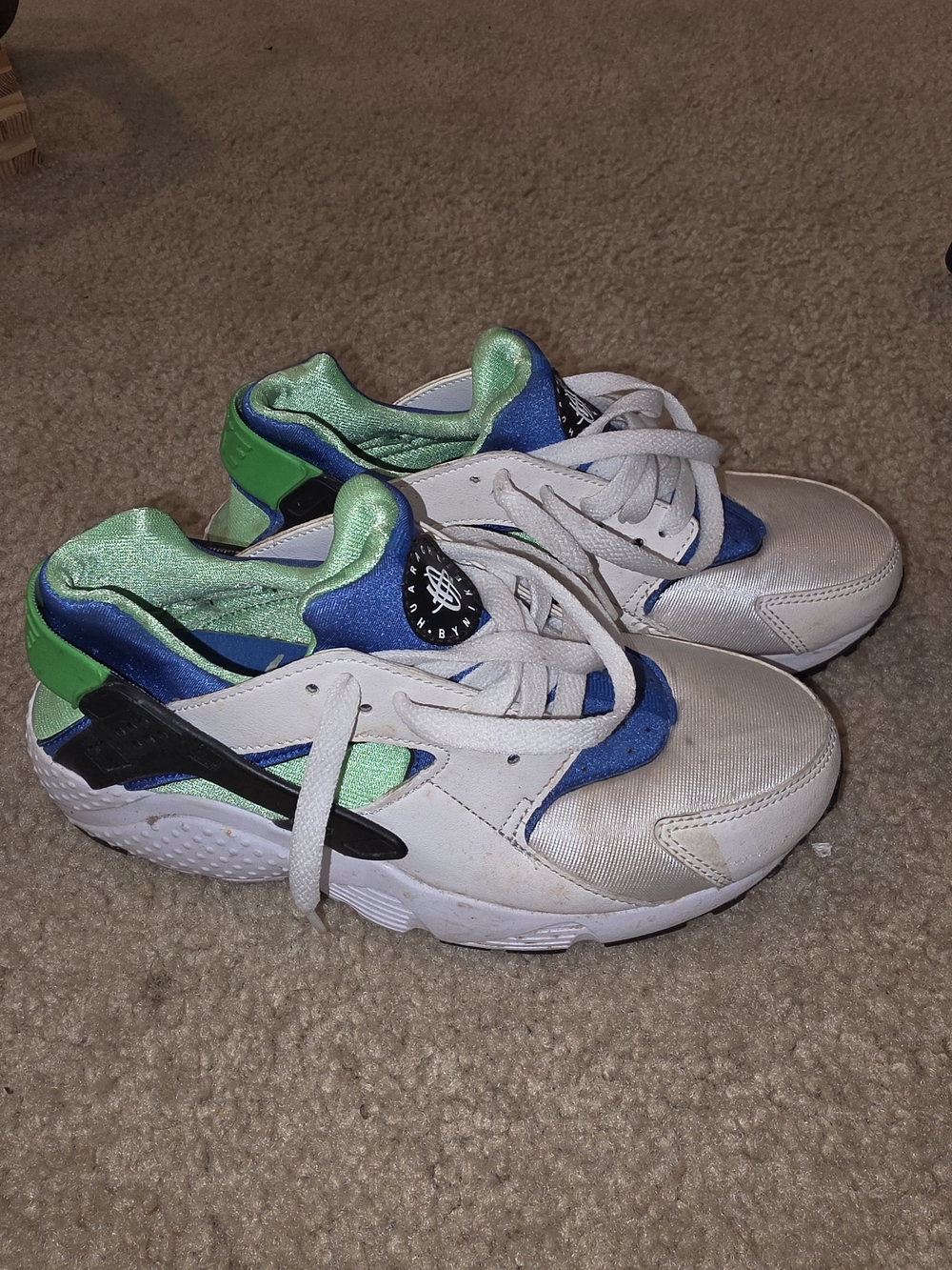 White Sneakers with Blue and Green Accents